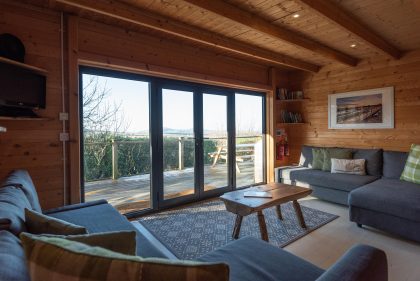 Toms Eco Lodge wood cabin lounge area